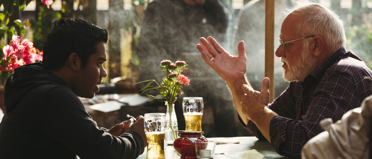 switzerland talks two men talking drinking beer
